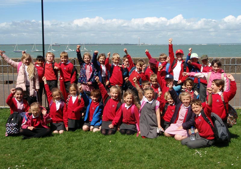 Picture of school children on a coach heading on their residential trip